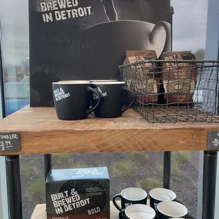 coffee cups on a shelf