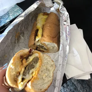 Bacon sausage egg cheese with bui sauce