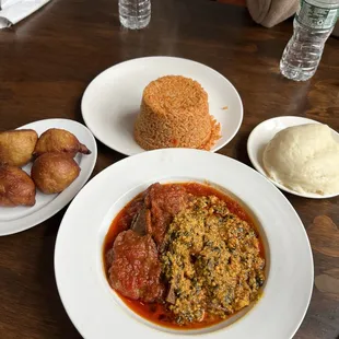 Goat stew, pof pof, side of fufu and rice