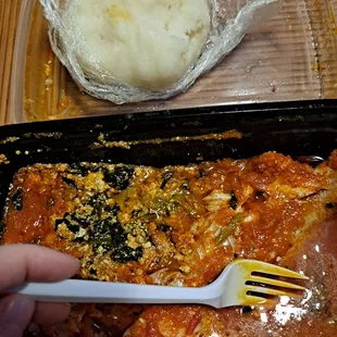 Red snapper, egusi sauce, fufu- pounded yam. Pretty good.