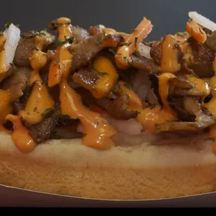 Banh Mi Dog Pork Belly, Banh Mi Slaw, Herb Blend and Sriracha Mayo on Quarter Pound All Beef Dog