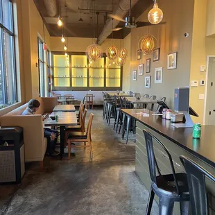 a restaurant with tables and chairs