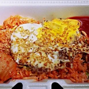 The overcooked fried egg and the soggy iceberg lettuce at the bottom of the dish left me with a 'meh' feeling about this dish