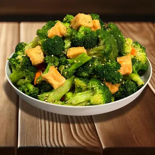a bowl of broccoli and tofu