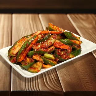 a plate of stir fried vegetables