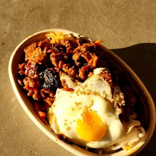 Spicy pork bibimbap with a runny egg