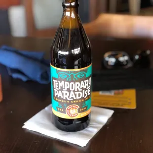 a bottle of beer on a table