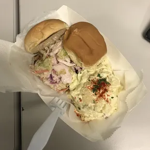 a sandwich and coleslaw