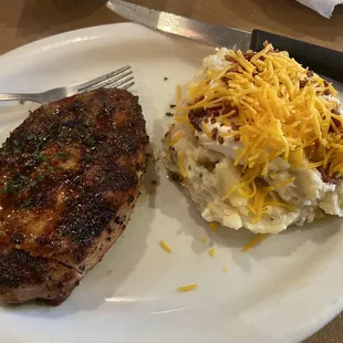 I had the Pork Steak, grilled and seasoned very well, Loaded Mashed Potatoes as my side.