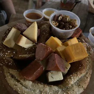 Large pretzel with meats and cheeses.