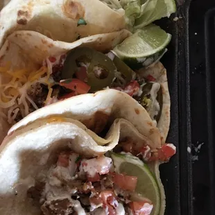 Beef, spicy beef and pork tacos