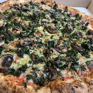 a whole pizza in a box