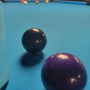 two balls on a pool table