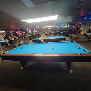 a pool table in a bar