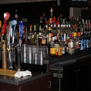 a bar full of liquor bottles