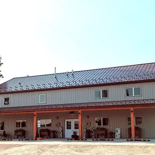 Store entrance (south side of building), summer of 2023.