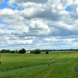 Baling hay at our home farm - making high quality feed for our cattle.