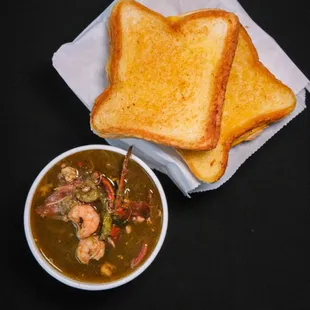 a bowl of soup and toast