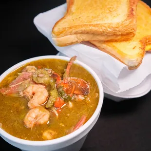a bowl of soup and toast