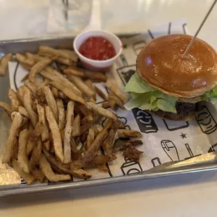Pimentology burger with fries. Great taste and atmosphere.