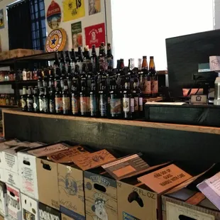 a shelf full of beer bottles