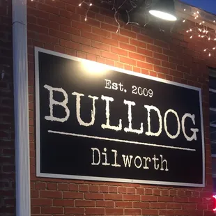 a brick building with a sign that says bulldog dilworth