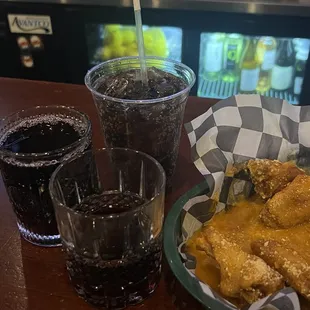 Wings and a generous pour of wine