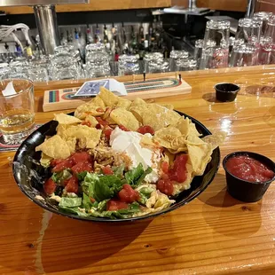 Kickin&apos; Chicken Taco Salad - Very good. It had chicken, beans, olives, jalapeños, sour cream, chips and salsa