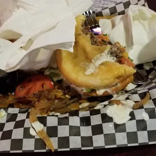 Half eaten bulldog burger