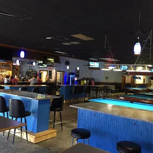 a pool table and bar