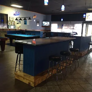 a pool table and bar