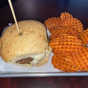 a burger and waffle fries