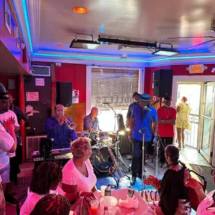 a group of people sitting around a table