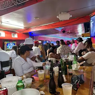 people sitting at a bar