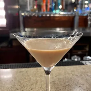 a drink in a martini glass