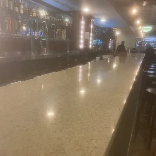 Super long bar for meeting friends and making new friends.