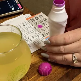 Music Bingo card.  You can use Shazam to help identify the tunes.