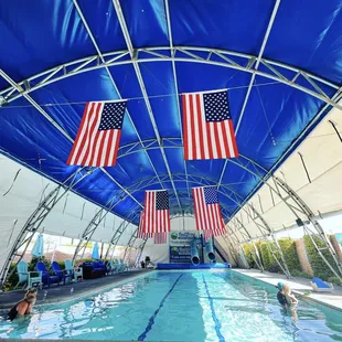 Our back pool is open February through October. We put the sides up or down depending on the weather. It's a cozy 90 degrees.