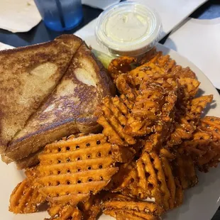 Grilled cheese and sweet potato waffle fries.
