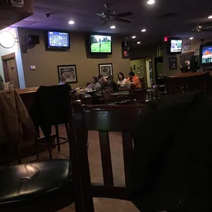 Large interior and TVs.