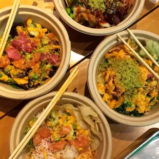 A variety of poke and bulgogi bowls. We enjoyed the crispy green tea flakes to top it off.