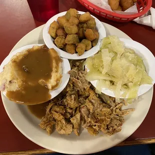 Daily special:  spicy pulled pork BBQ with mashed potatoes, steamed cabbage and fried okra!