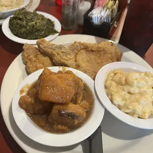 Pork chop Entree Mac and cheese yams turnip greens