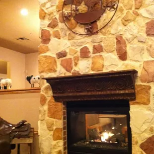 a fireplace with a clock above it