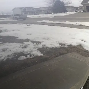 After - cannot see any evidence of a dent even a few inches away from the car