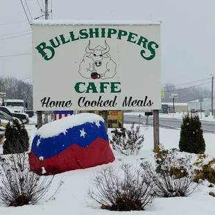 a sign in the snow
