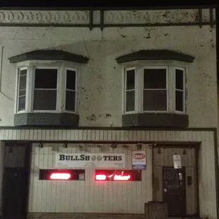 the front of a building at night