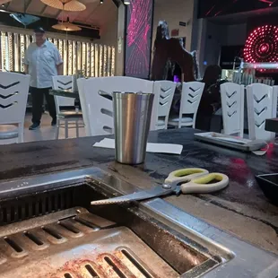 The table. The setting