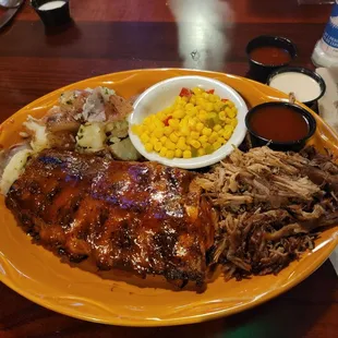 Half Rack Ribs and Pulled Pork combo with redskin pots and corn o'brien