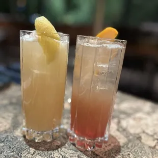 two cocktails on a table